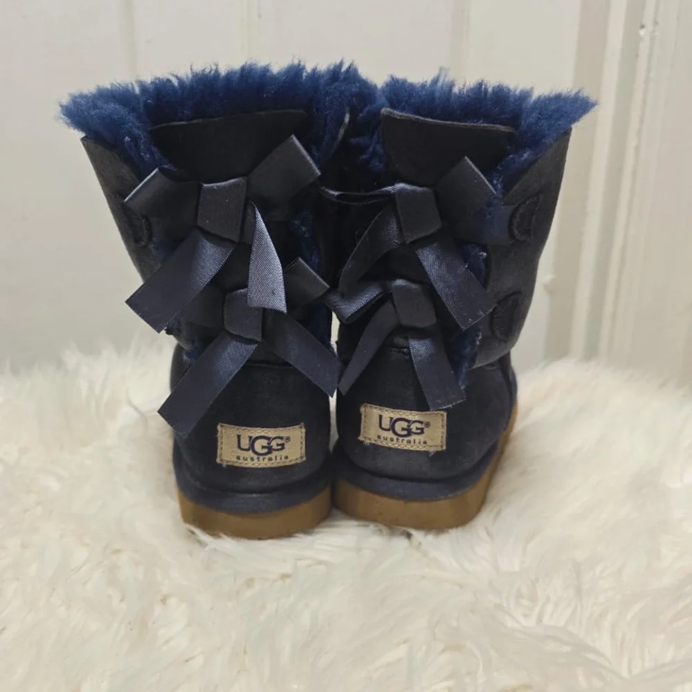 UGG Kid’s Bailey Bow II boots in a navy blue suede